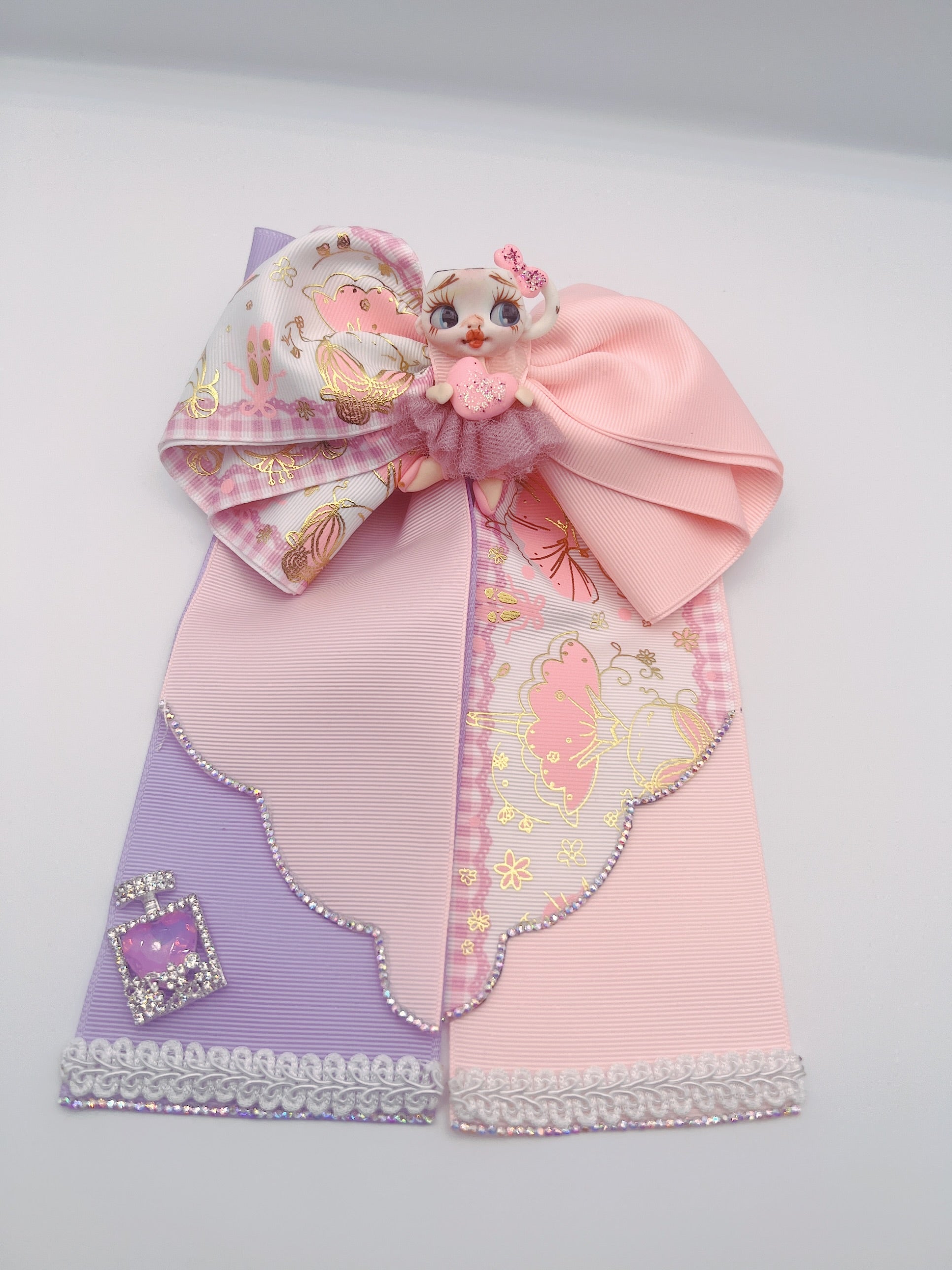 Moños con muñeca clays